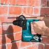 Aku vrtací kladivo s příslušenstvím 2x12V/1,5Ah Makita HR140DWYE1